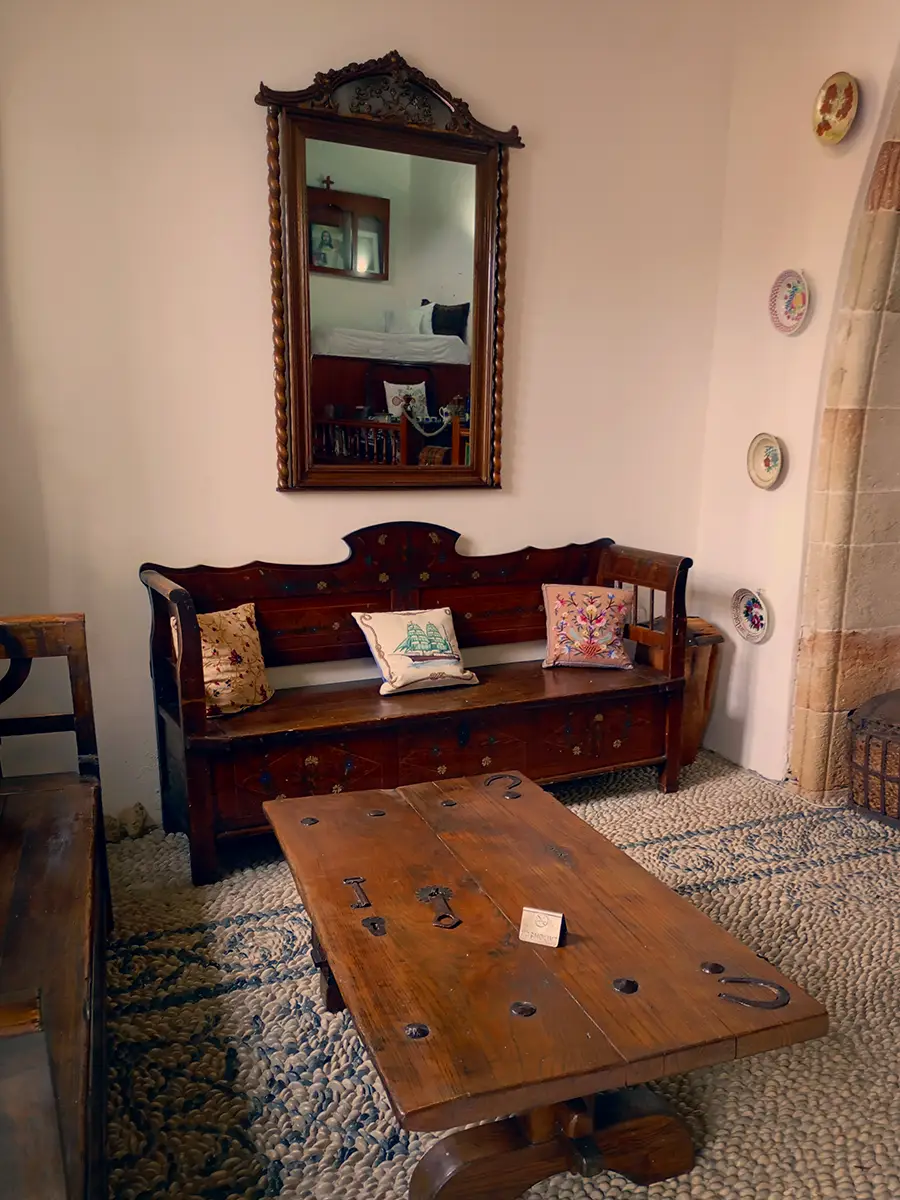 Interior of Captains Houses of Lindos, highlighting the lavishly decorated "Sala" and its impressive features.